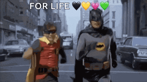 Batman And Robin Running Away GIF