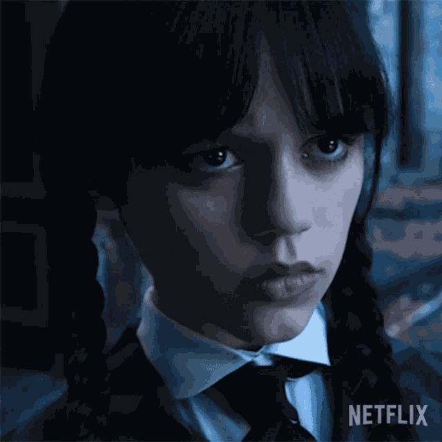 Blank Stare Wednesday Addams GIF