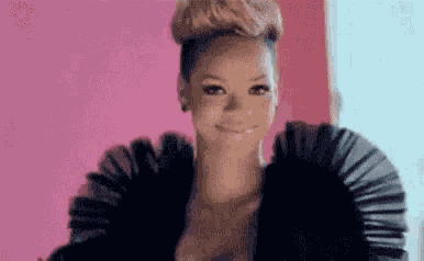 Blushing Rihanna GIF