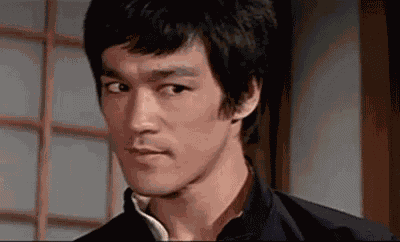 Bruce Lee Smirk GIF