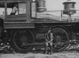 Buster Keaton Riding Side Of Train The General GIF