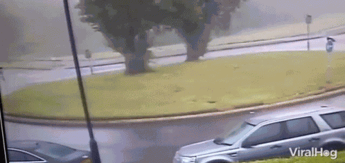 Car Crashing Roundabout Viralhog GIF