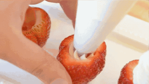 Cheesecake Stuffed Strawberries GIF