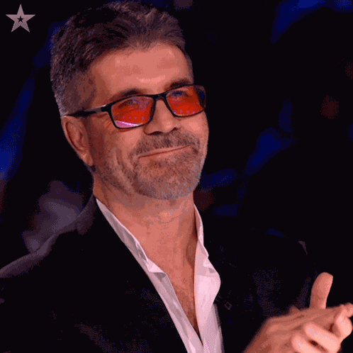 Clapping Simon Cowell GIF