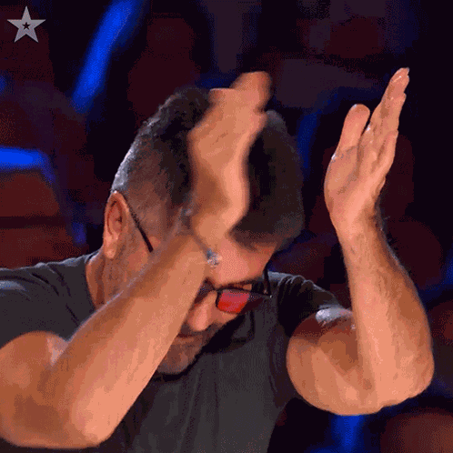 Clapping Simon Cowell GIF