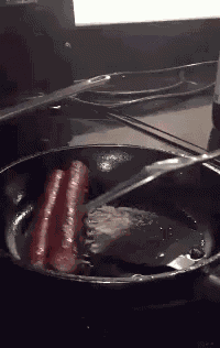 Cooking Sausage GIF