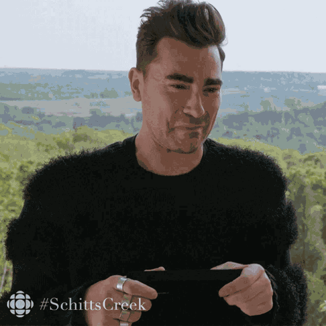 Crying Dan Levy GIF
