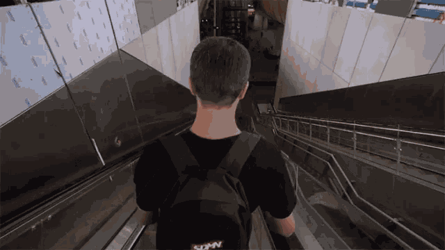Escalator Turn Back GIF