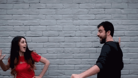 Evan And Katelyn Extreme High Five GIF