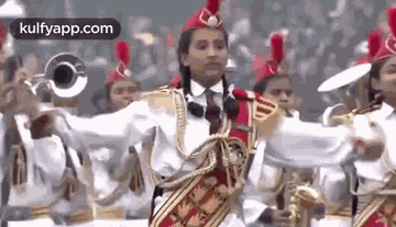 Female Soldier Saluting To National Flag.Gif GIF