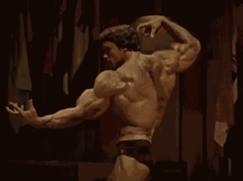 Flexing Arnold GIF