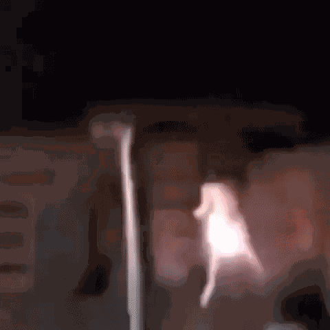 Flying Doll With Fireworks GIF