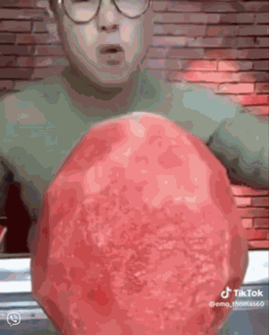Funny Chinese Guy Eating Watermelon GIF
