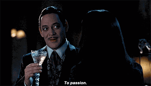 Gomez Addams Gomez And Morticia GIF