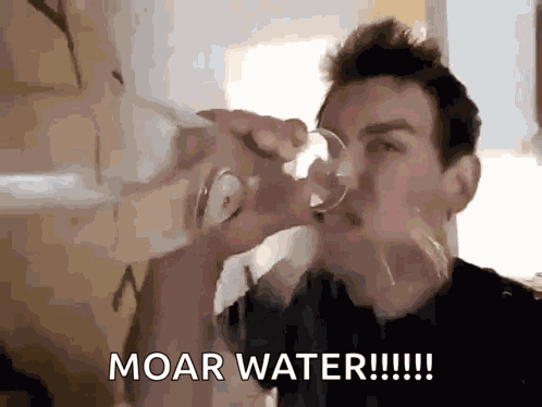 Guy In Black Shirt Thirsty GIF