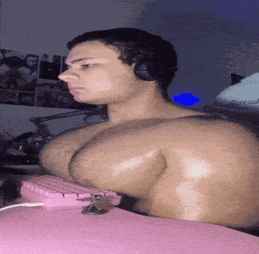 Guy Typing Nipples GIF
