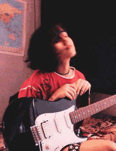 Headbanging Guitar GIF