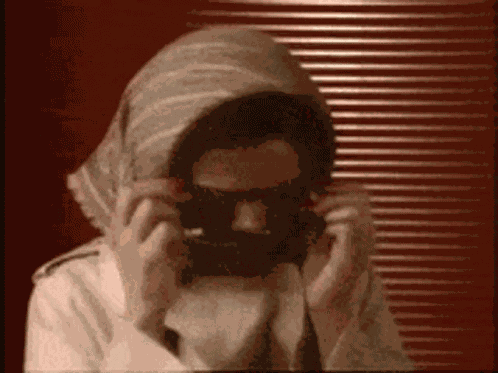Hiding Sunglasses GIF
