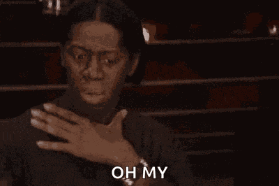 J Alexander Clutching My Pearls GIF