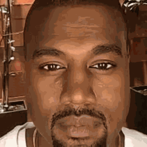 Kanye Staring Kanye Licking GIF