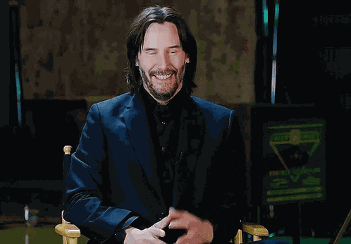 Keanu Reeves Laughing GIF