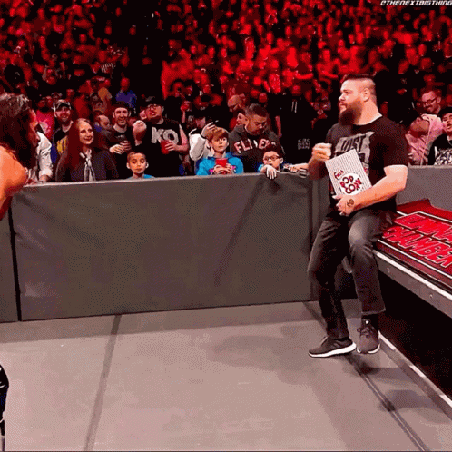 Kevin Owens Throws Popcorn GIF