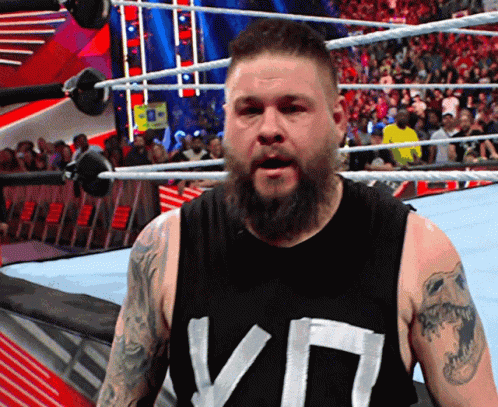 Kevin Owens Wink GIF