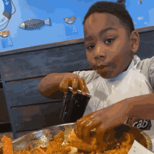 Kid Eating Kid Drinking In Black Cup GIF