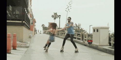 Kimberly Cole Rollerskating GIF
