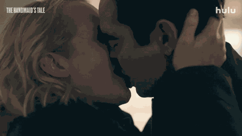 Kissing June Osborne GIF