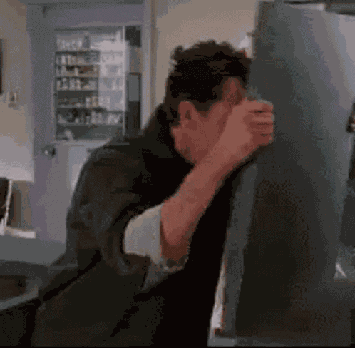 Knocking Head Stupid GIF