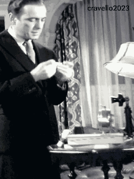 Licking A Joint Humphrey Bogart GIF