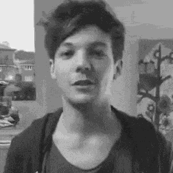 Louis Tomlinson Blowing Kisses GIF