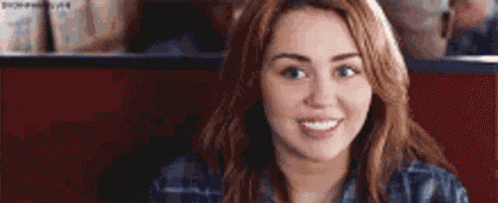 Miley Cyrus Wink GIF