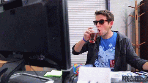 Multitasking Drinking GIF