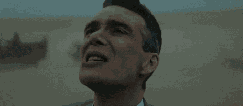 Oppenheimer Walking Through A Sandy Storm Oppenheimer Movie GIF