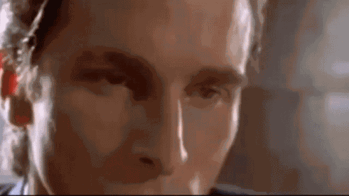 Patrick Bateman Dropping Phone GIF
