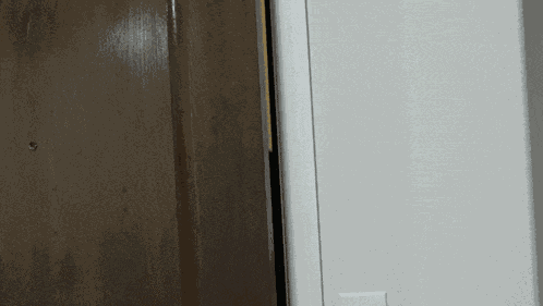 Peeking Mark Philips GIF