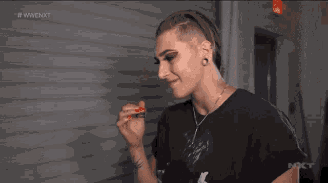 Rhea Ripley Hair Flick GIF