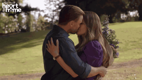 Riverfront Romance Kiss GIF