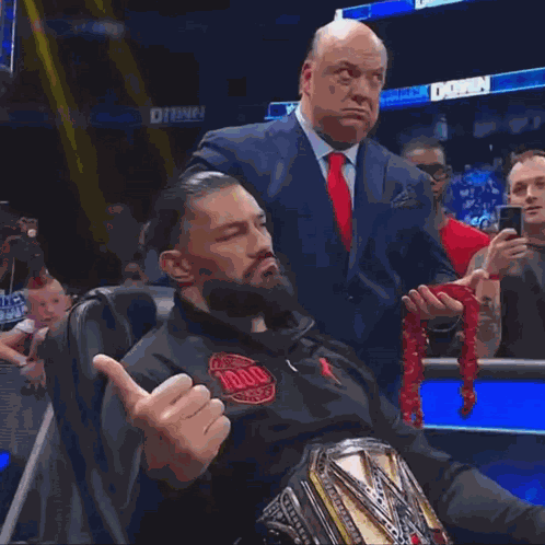 Roman Reings Paul Heyman GIF