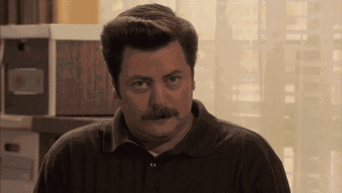 Ron Swanson Mischievous GIF