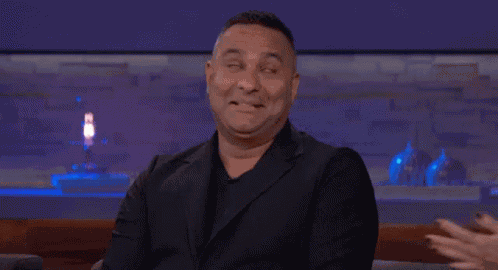 Russell Peters Head Shake GIF