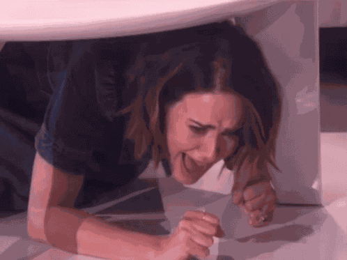 Sarah Paulson Screaming Crying Under The Table GIF