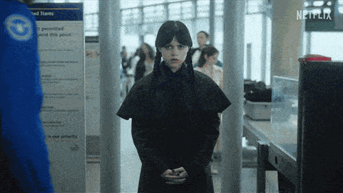 Scanning Wednesday Addams GIF