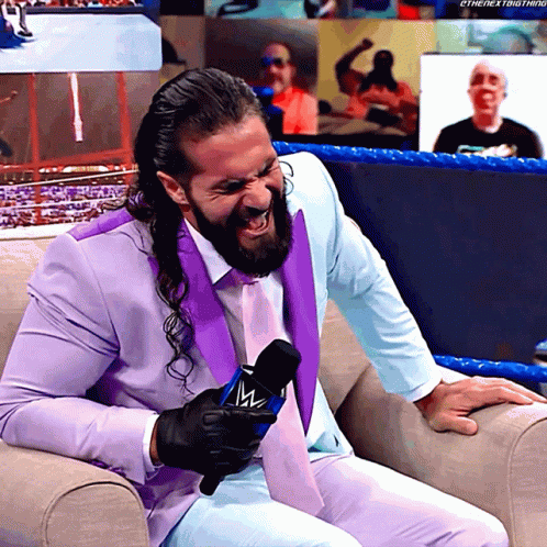 Seth Rollins Bayley GIF