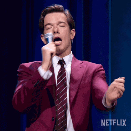 Shaking John Mulaney GIF