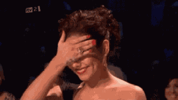 Shy Smiling GIF