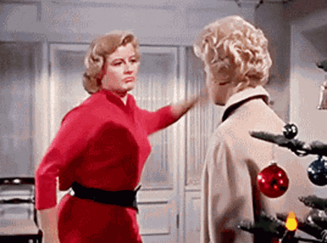 Slap Christmas GIF