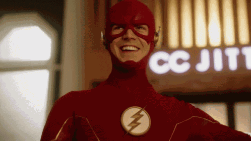Smiling Grant Gustin GIF